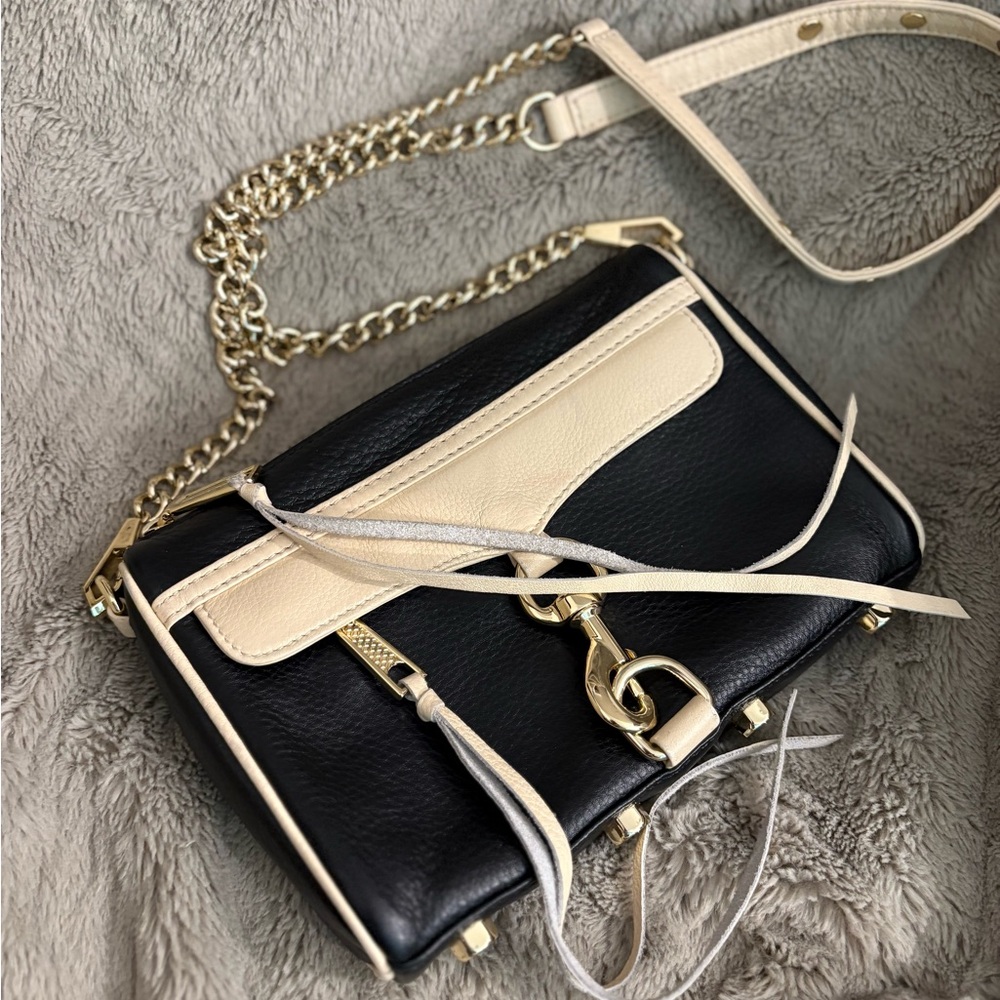 Rebecca Minkoff Elegant Black and Cream Crossbody Bag with Gold Accents